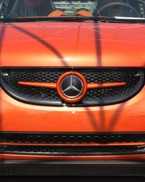 he Front end of the new Smart Fortwo 453 in Lava Orange, customized by Smart Power Design.