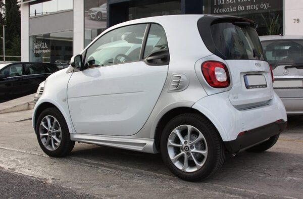 This is the rear view of a Smart Fortwo 453 with Smart Power Design's Fender Flares and Side Skirts installed.